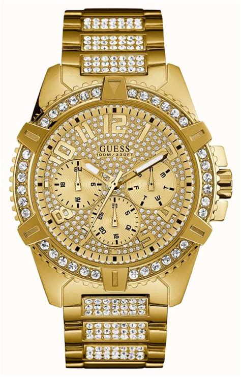 gold guess watch with diamonds.